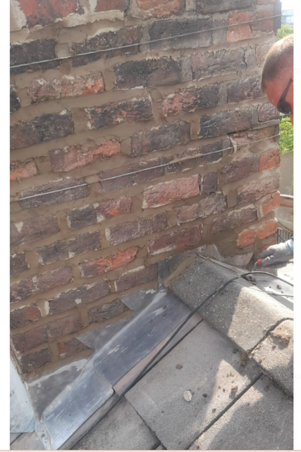 Chimney repair with new lead flashing